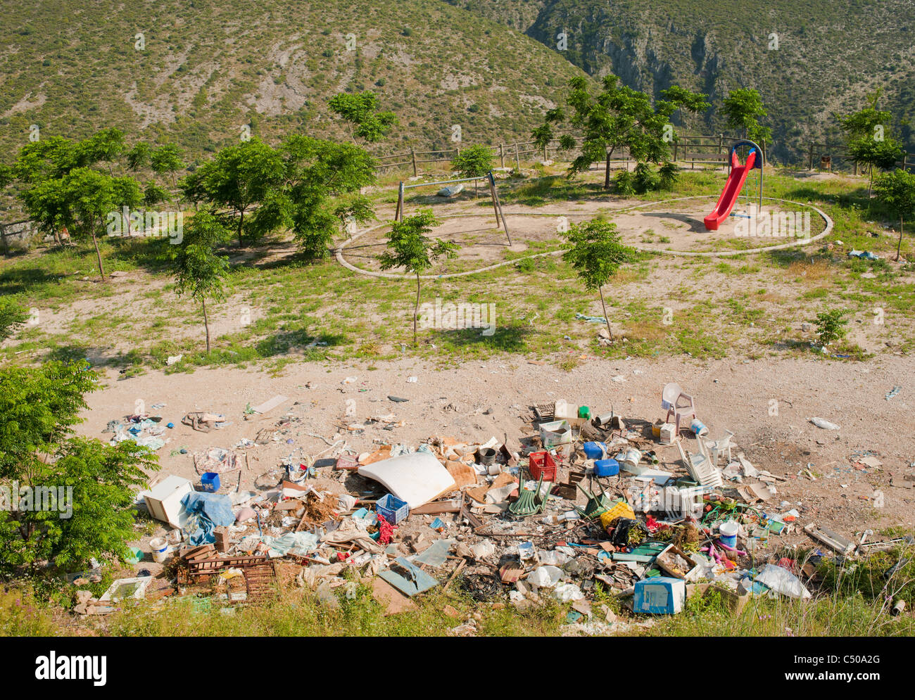 Irresponsible rubbish dumping on a beautiful playground Stock Photo Alamy