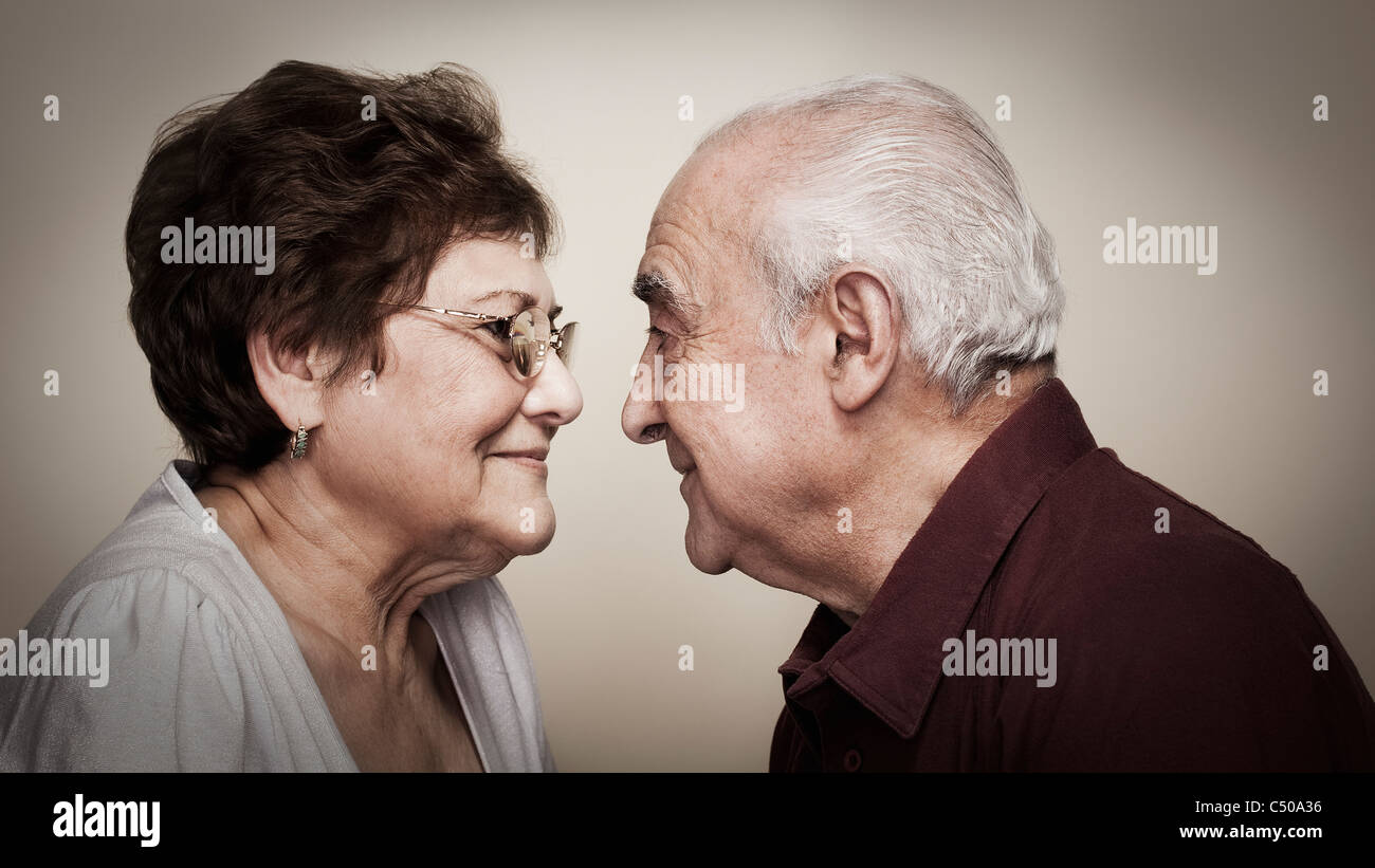 Senior Hispanic couple face to face Stock Photo - Alamy