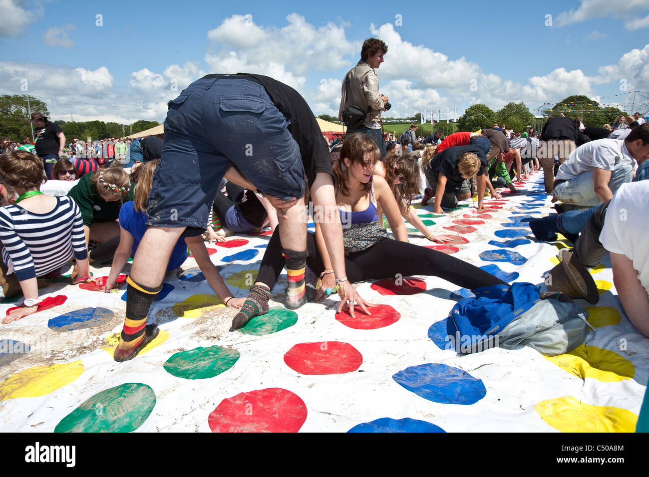 World record attempt at the largest game of twister at the Glastonbury Festival 2011 Stock Photo