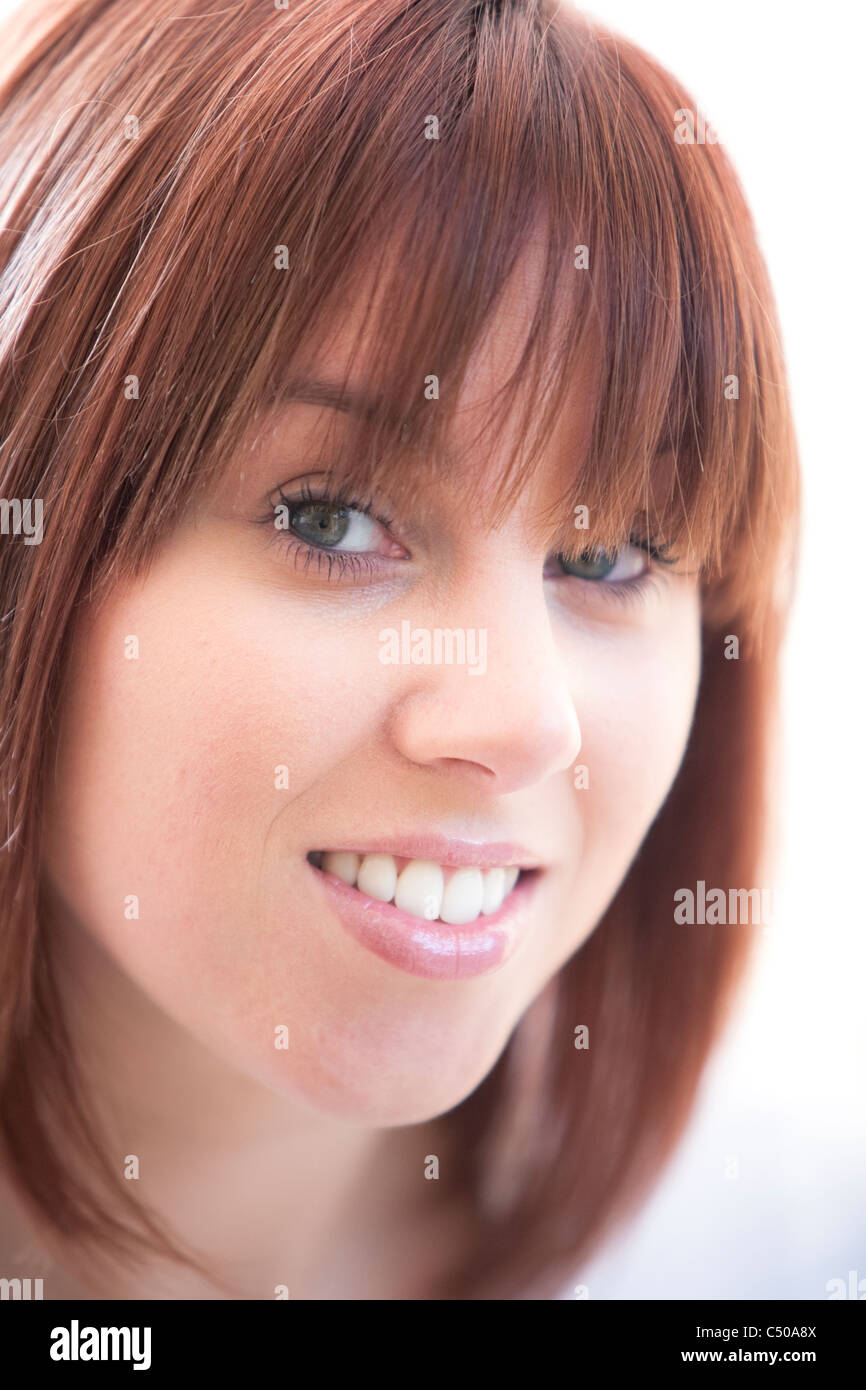 High key portrait of attractive young woman smiling Stock Photo - Alamy
