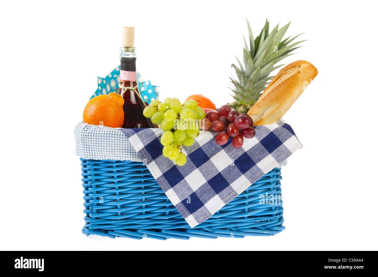 Picnic basket with bread fresh fruit and wine Stock Photo - Alamy