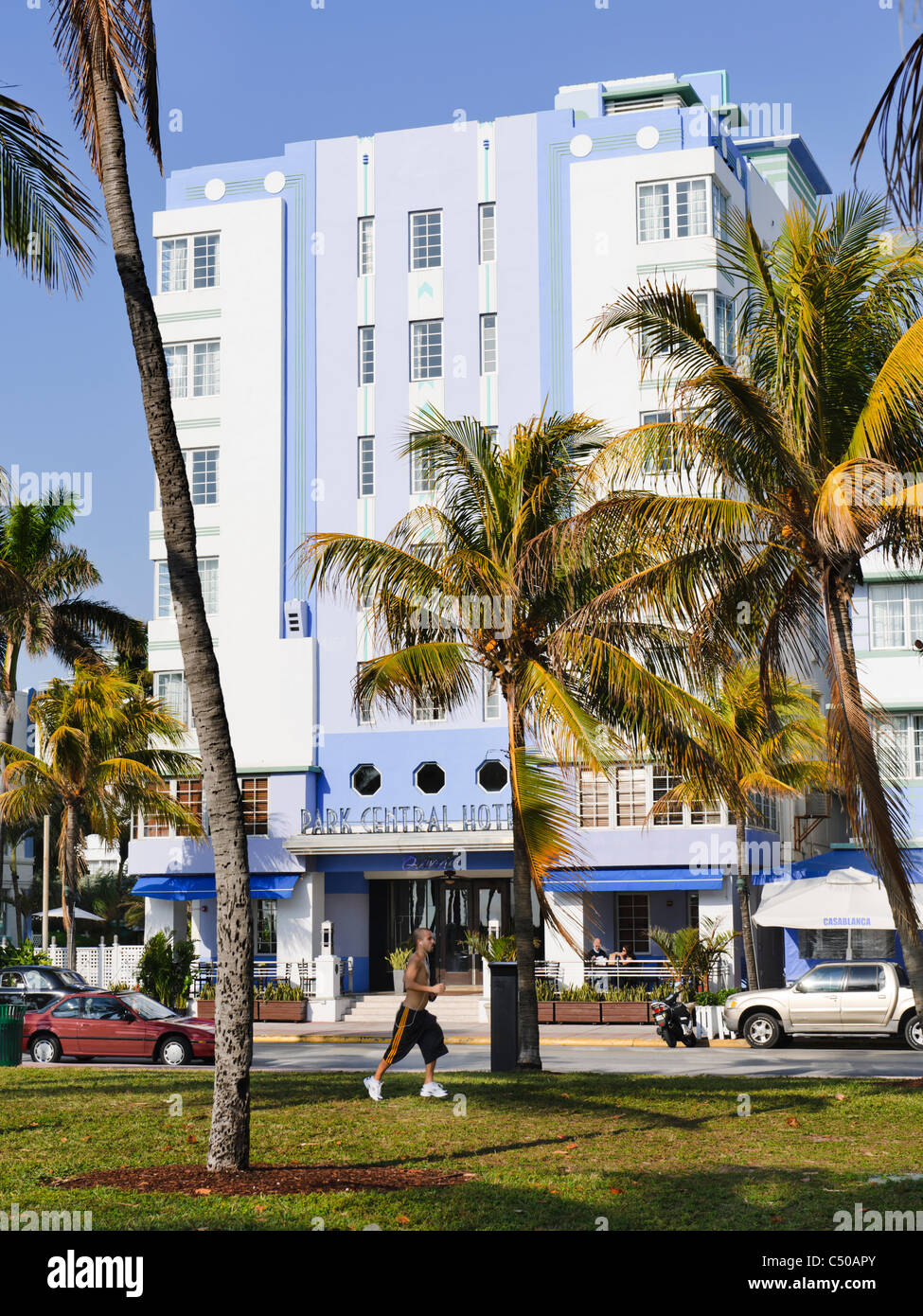 Man jogging outside Park Central Hotel, South Beach, Miami Stock Photo