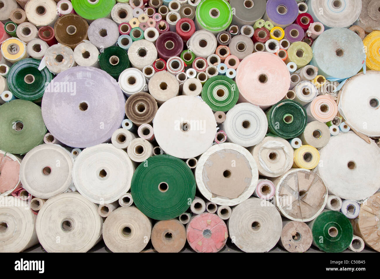 Old color paper roll wall Stock Photo