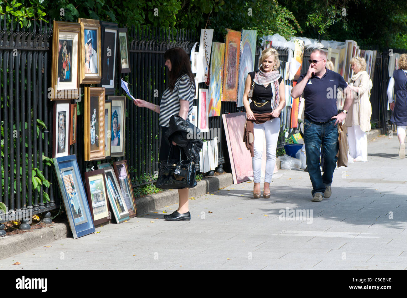Woman pricing art Stock Photo