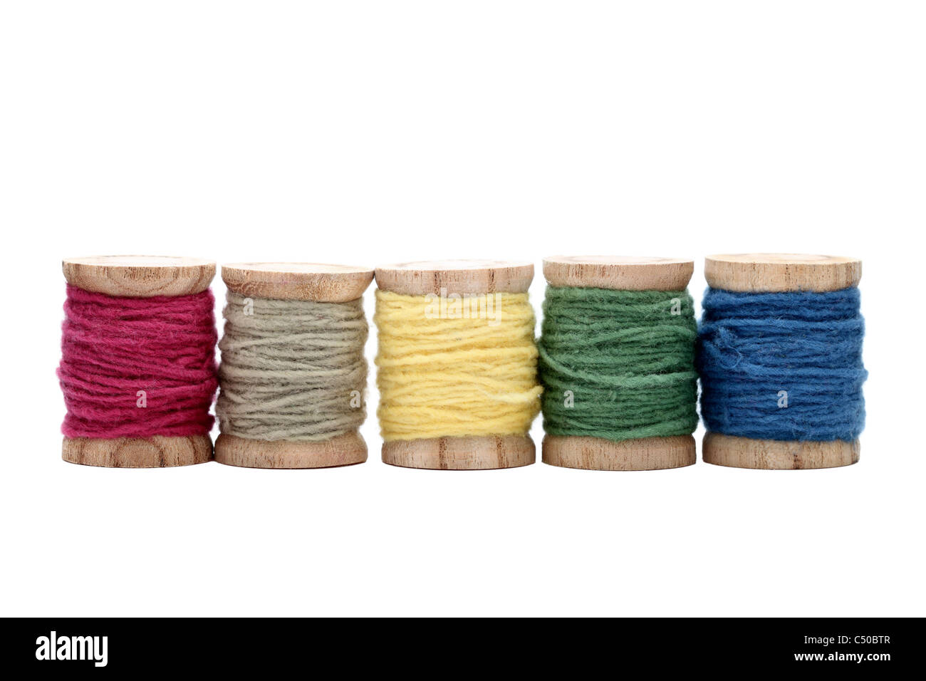 Spool of thread isolated on white background Stock Photo - Alamy