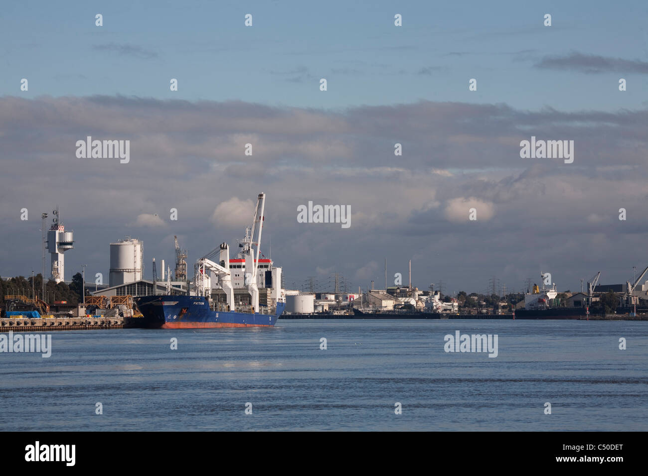 Cargo Ship 'Fiction ' loading cement on the Yarra River Melbourne Victoria Australia Stock Photo