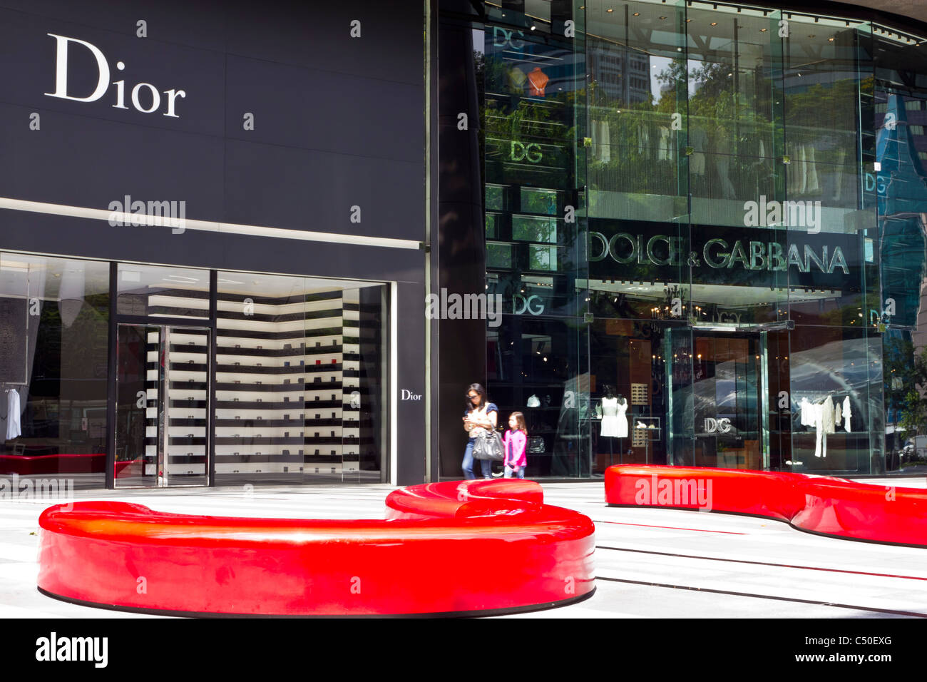 Dior and Dolce & Gabbana shops in Singapore's ION Shopping Centre Stock Photo