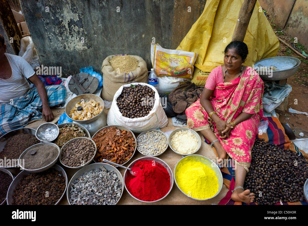 Selling Kumkum cosmetic powder at the market of Gokarna, during the Shivaratri religious festival Stock Photo