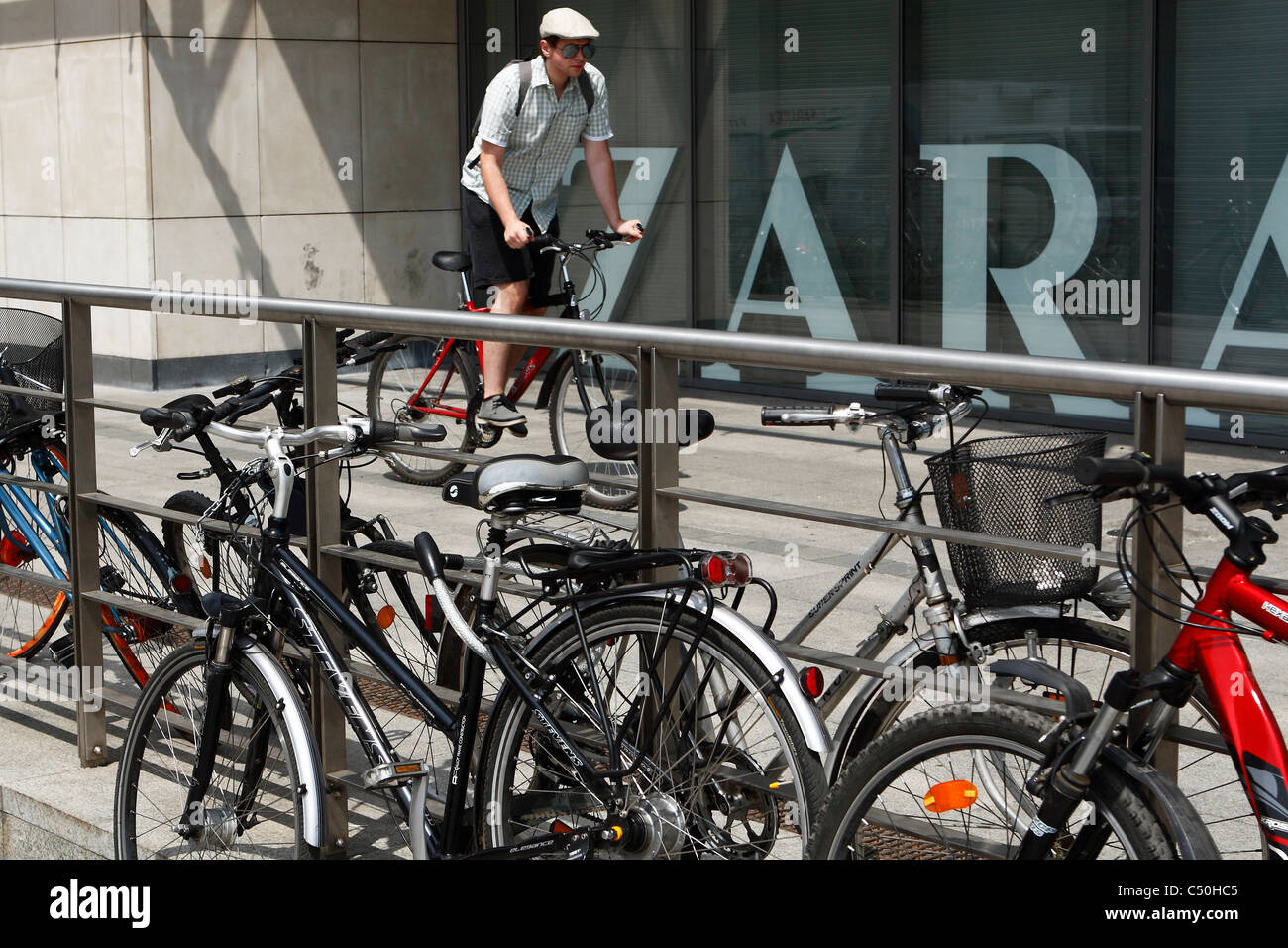 Bicycles parked in front of 'Galeria Krakowska'- a huge shopping mall in Krakow downtown. Stock Photo