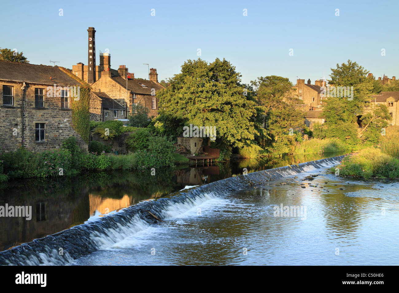 A wier on the River Aire, in Bingley, West Yorkshire Stock Photo