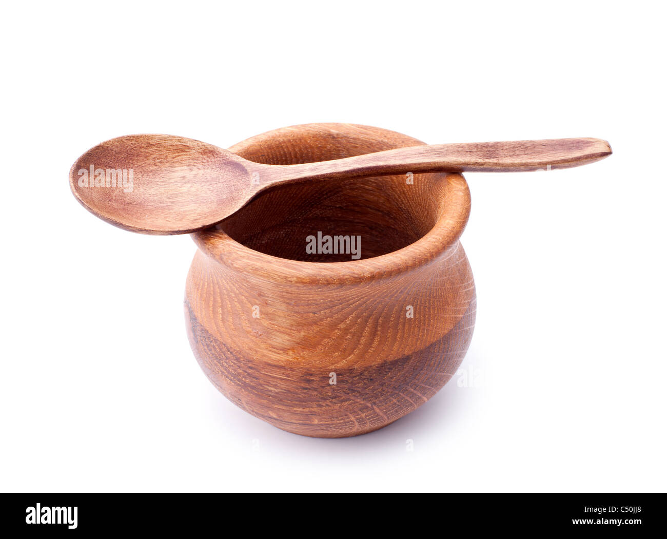 Wooden bowl and spoon isolated on white background Stock Photo - Alamy