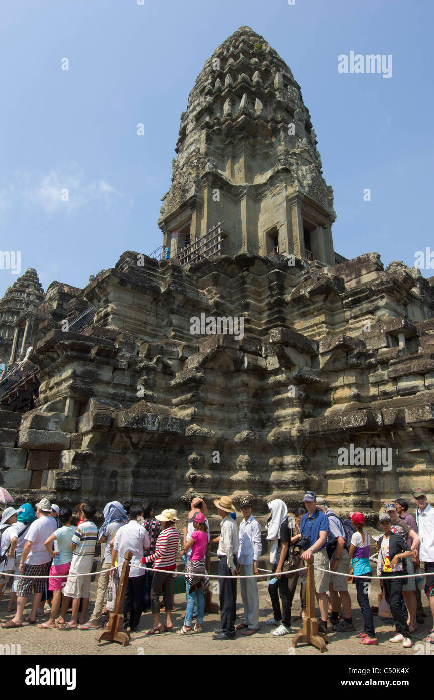 Tourists queueing to get up to the Central Sanctuary on the third level of Angkor Wat, Angkor, Siem Reap, Cambodia Stock Photo