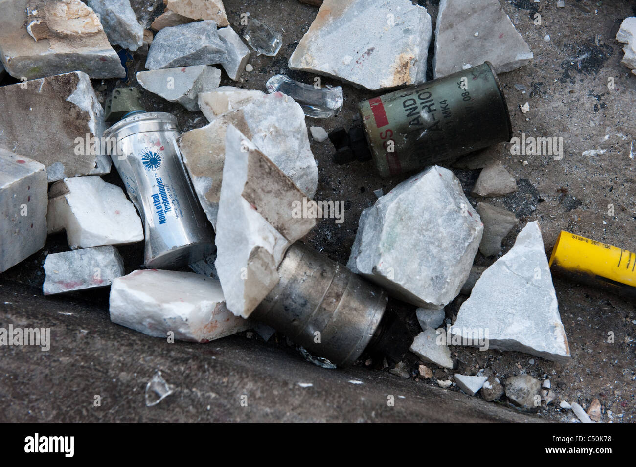 Used CS (Orthochlorobenzalmalononitrile) tear-gas canisters in Syntagma (Constitution) square during the protests in Athens Stock Photo