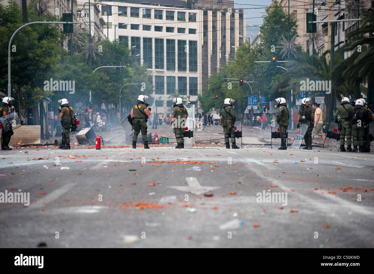 Riot police in Panepistimiou street during the the protests in Athens ...