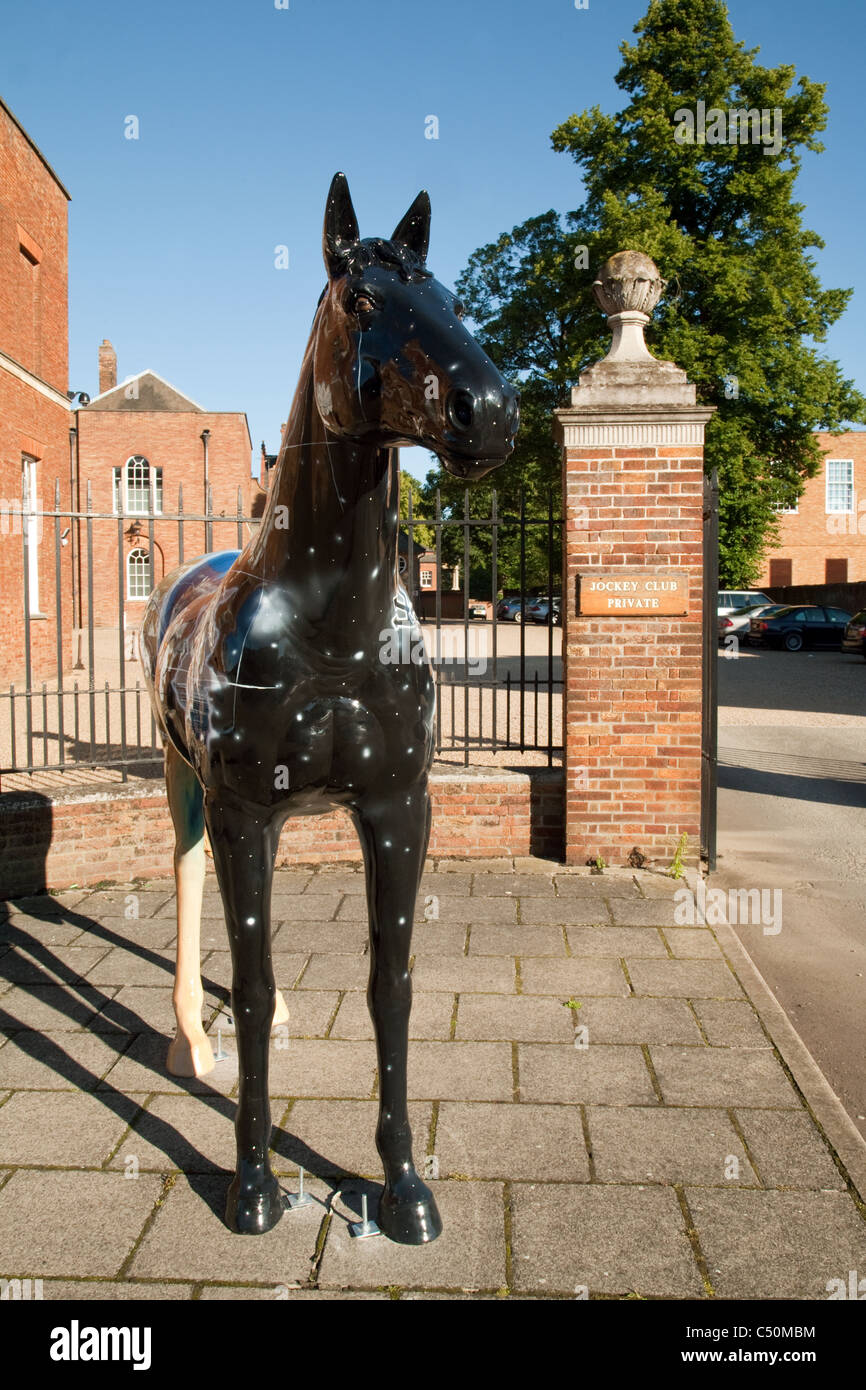 Painted horse outside the entrance to the Jockey club, Newmarket town, Suffolk UK Stock Photo