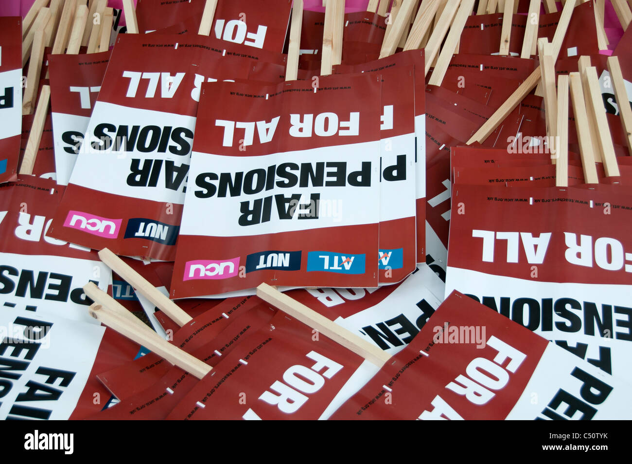 One day strike by teachers and civil servants to protest at changes in pensions - pile of placards before the march Stock Photo