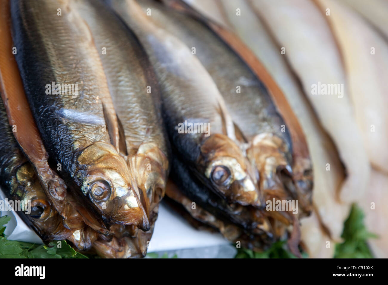 Herring for sale on market stall Stock Photo Alamy