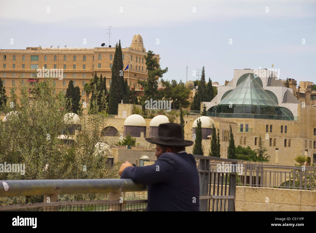 Orthodox Jew looking at the King David Hotel and HUC building, Jerusalem Israel Stock Photo