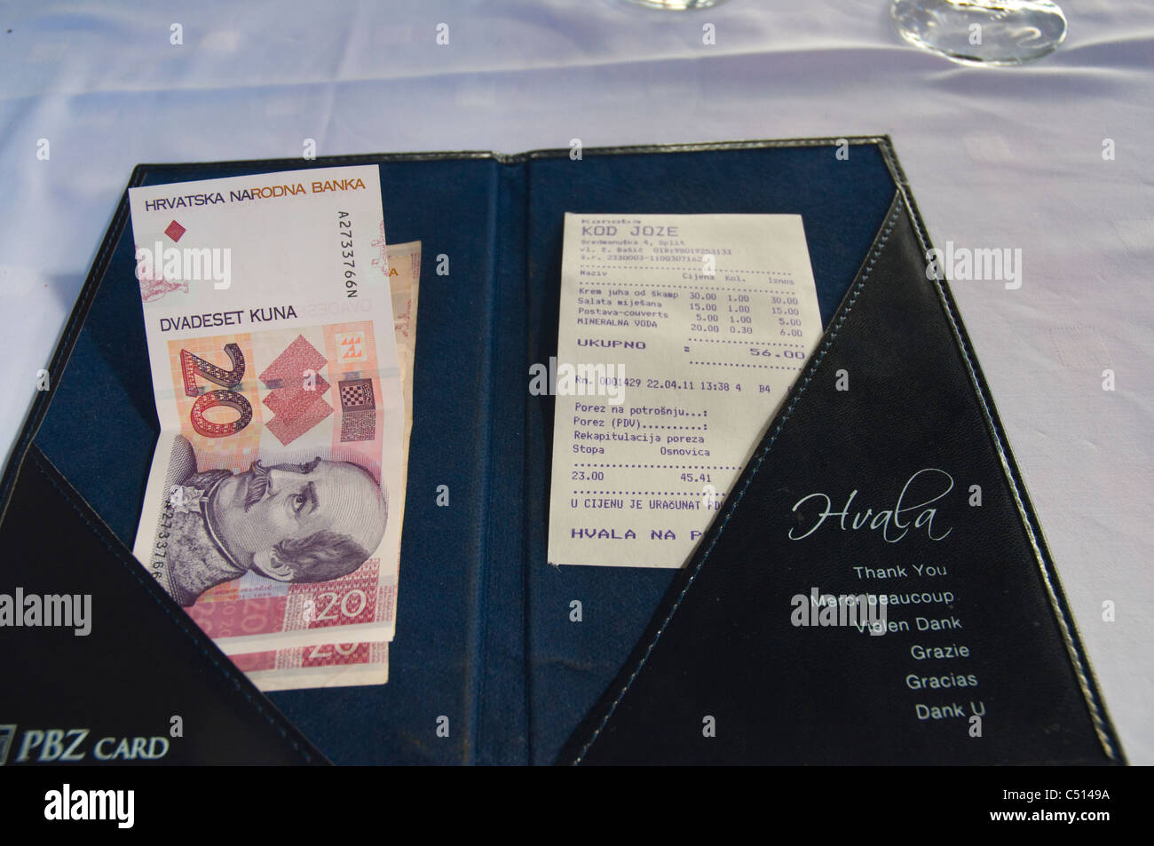 Restaurant bill and Croatian currency Kuna in restaurant Split Dalmatia Croatia Europe Stock Photo
