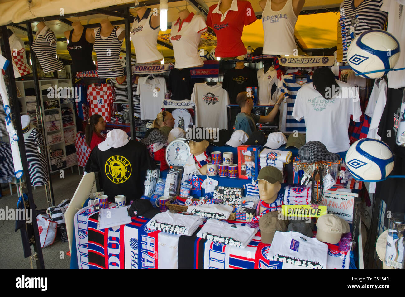 t-shirts and scarves of hajduk split are on sale as souvenirs in a market  stall in split croatia Stock Photo - Alamy