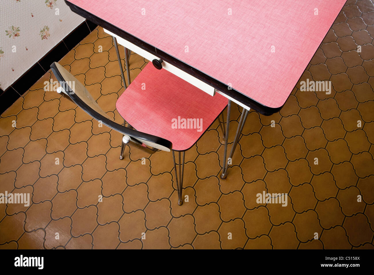 Empty chair at table, overhead view Stock Photo