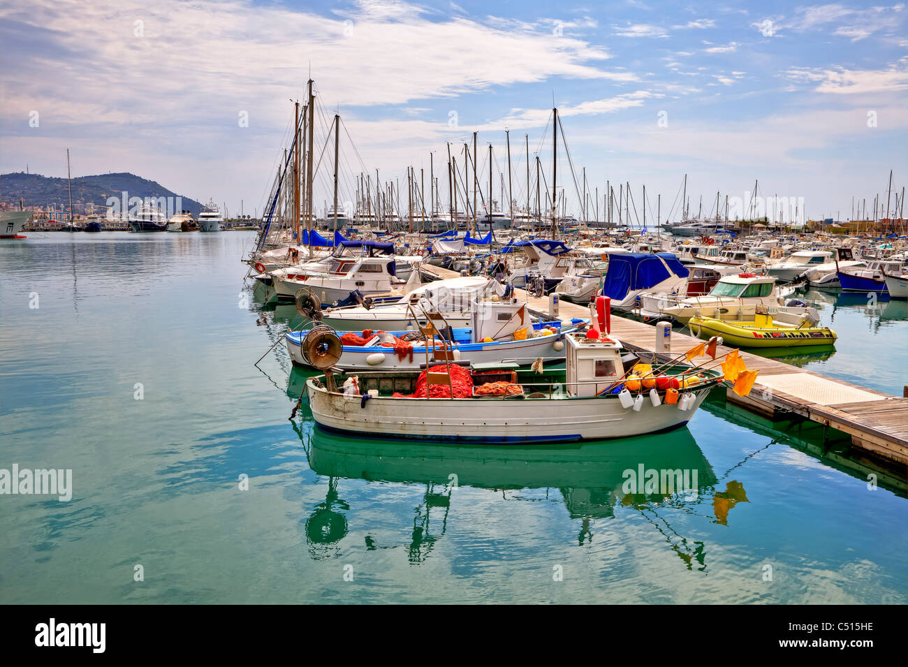 The port of Porto Maurizio - Imperia - Liguria - Italy with yachts, sailing  boats and old fishing boats Stock Photo - Alamy