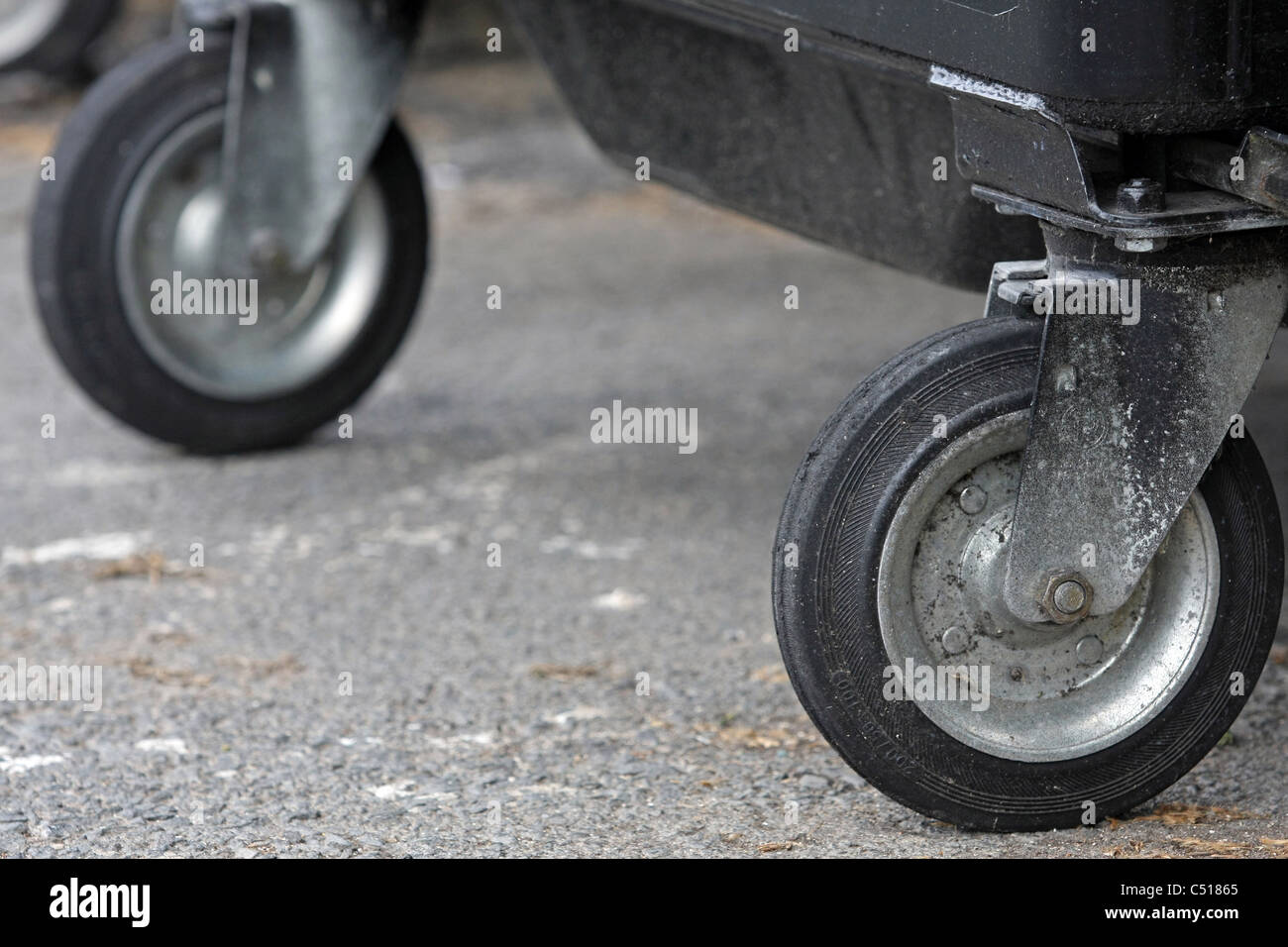 Two wheels of a wheelie bin Stock Photo Alamy