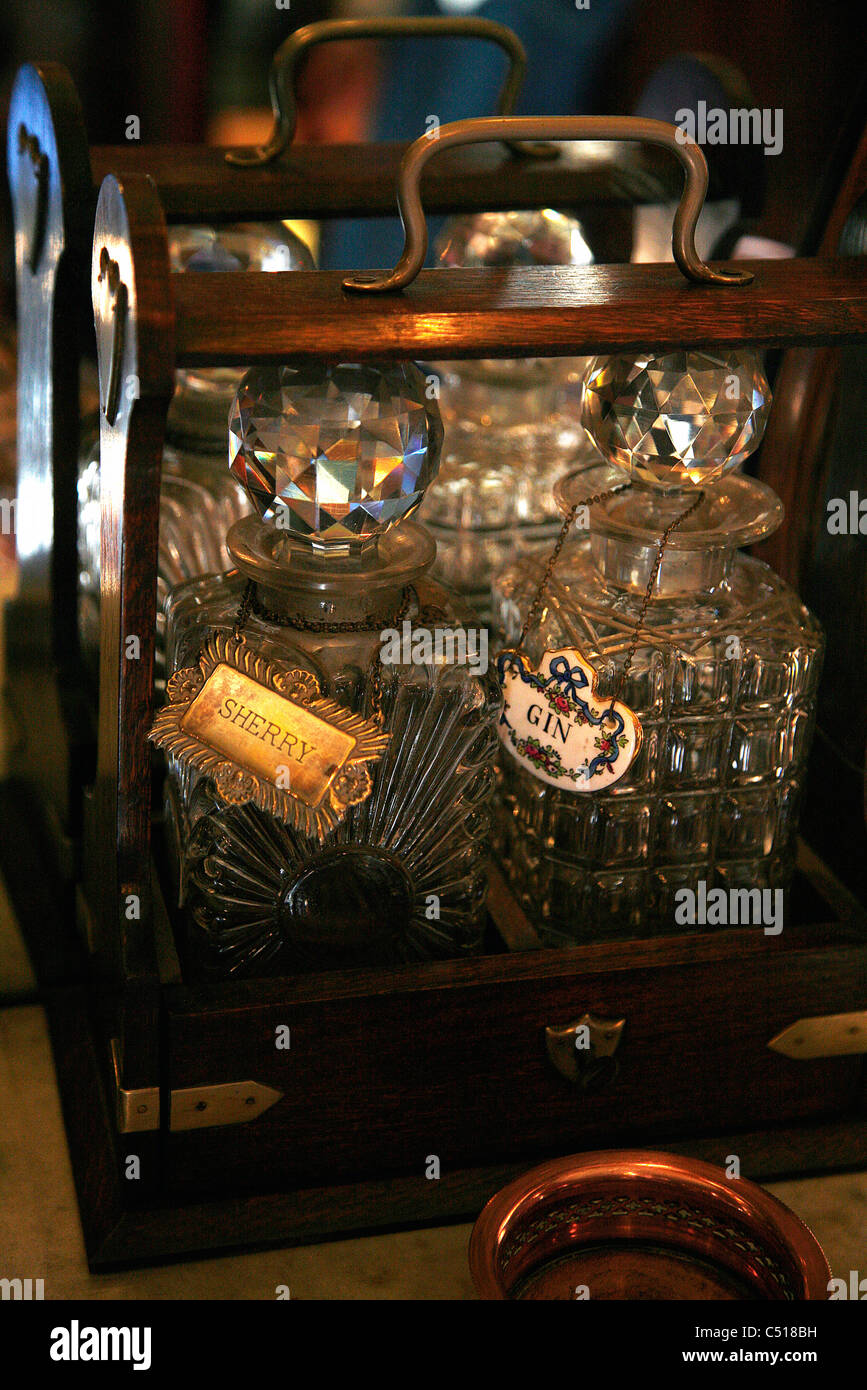 Decanters of liquor in wooden carrying case Stock Photo
