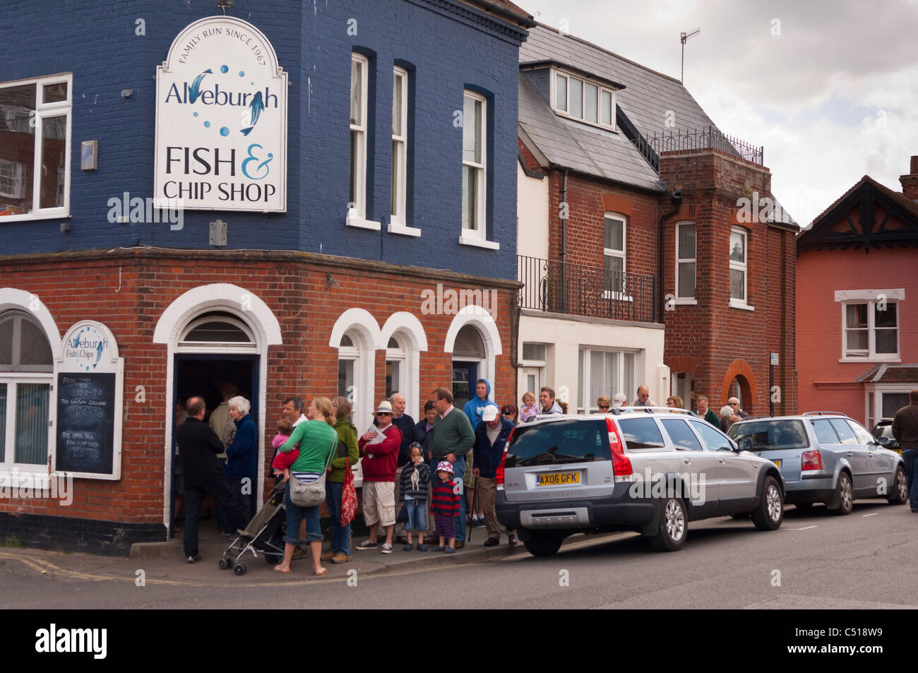 People queue outside Aldeburgh fish & chip shop in Aldeburgh , Suffolk , England , Britain , Uk Stock Photo