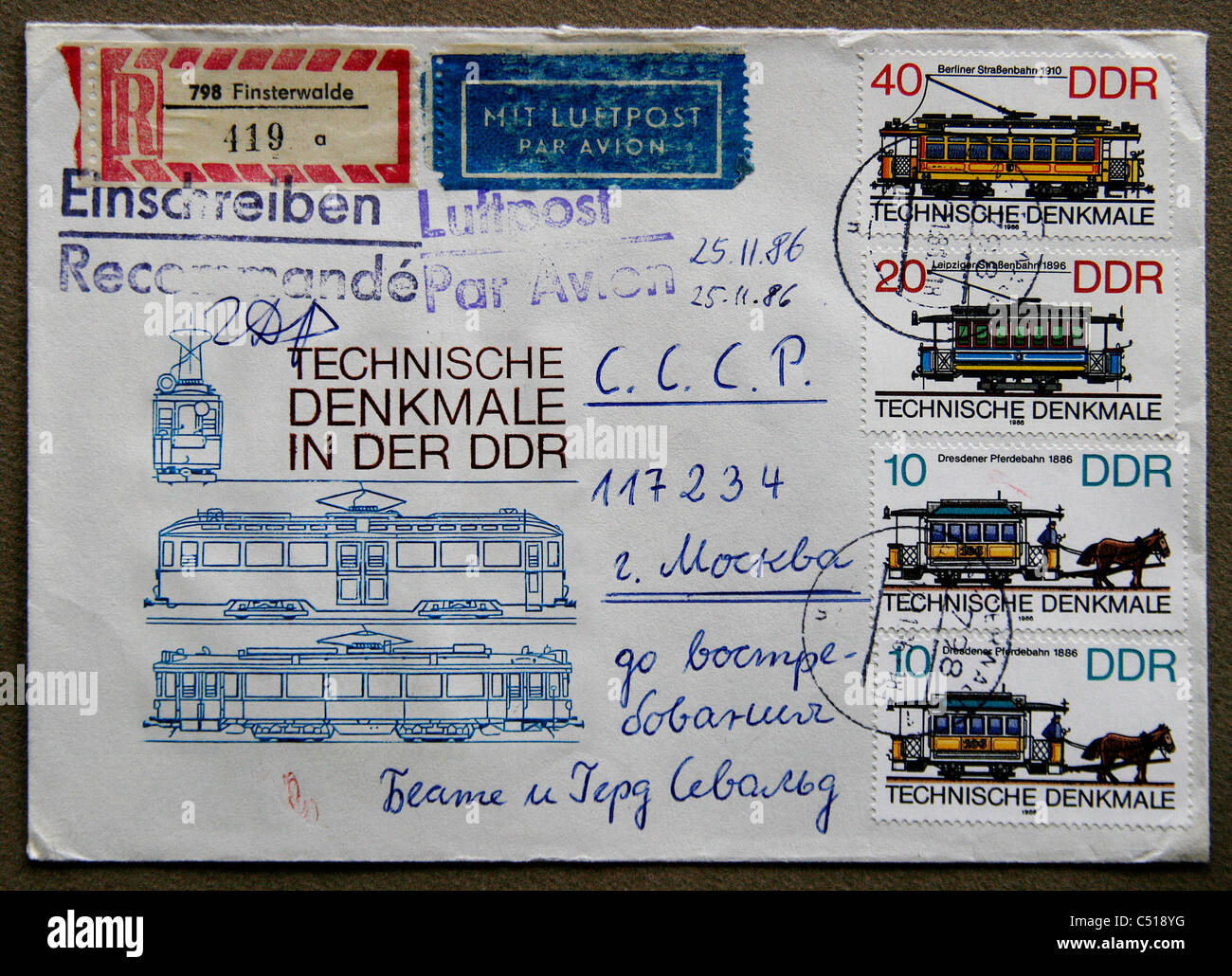 An old envelope with a print and different kind of stamps of the ...