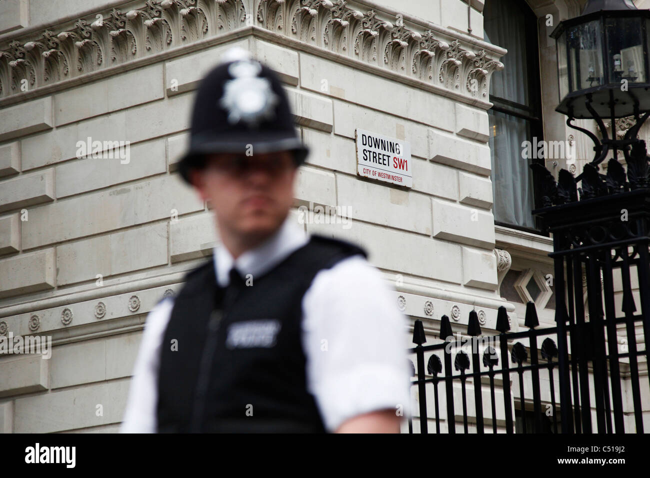 Policeman outside Downing Street in central London. Part of a strong security cordon protecting the home of the Prime Minister. Stock Photo