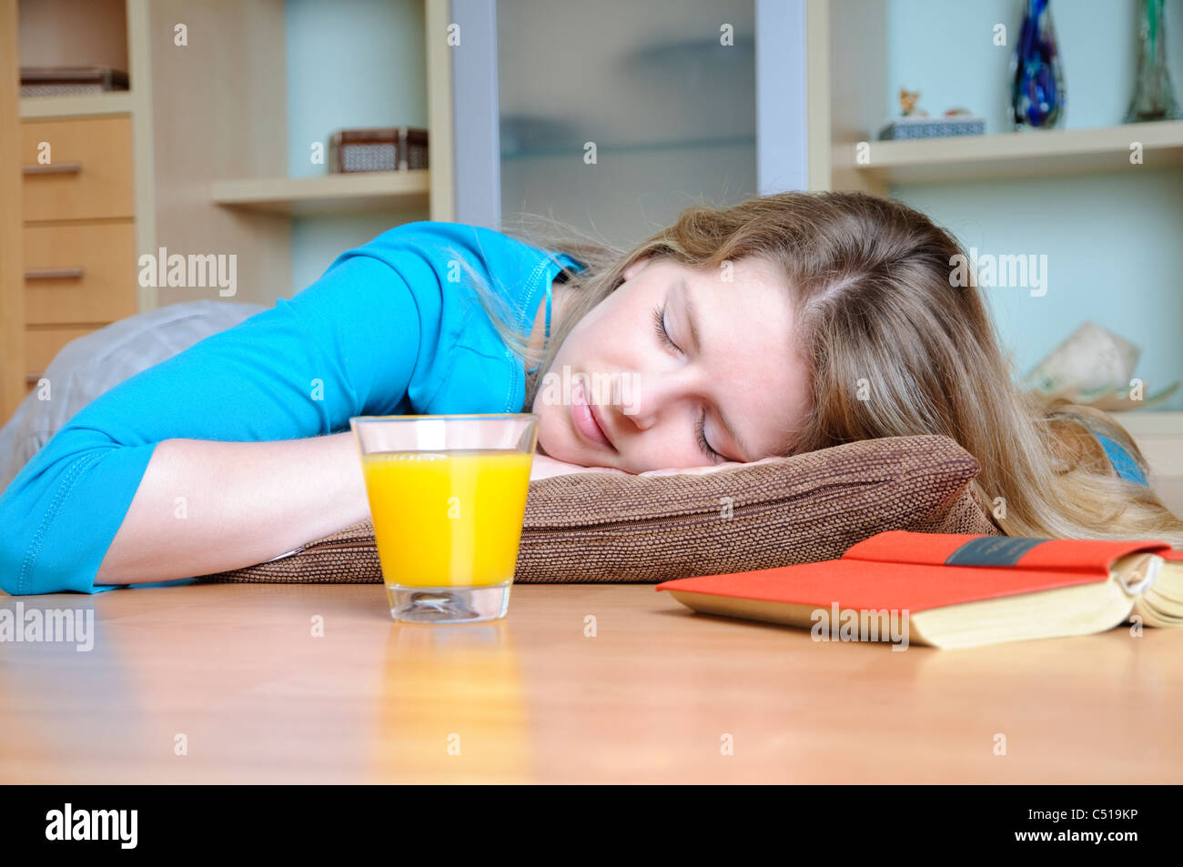 Woman sleeping on the floor Stock Photo Alamy