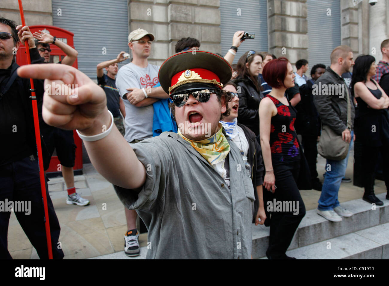 Protester shouts during the general strike march in central London. Stock Photo