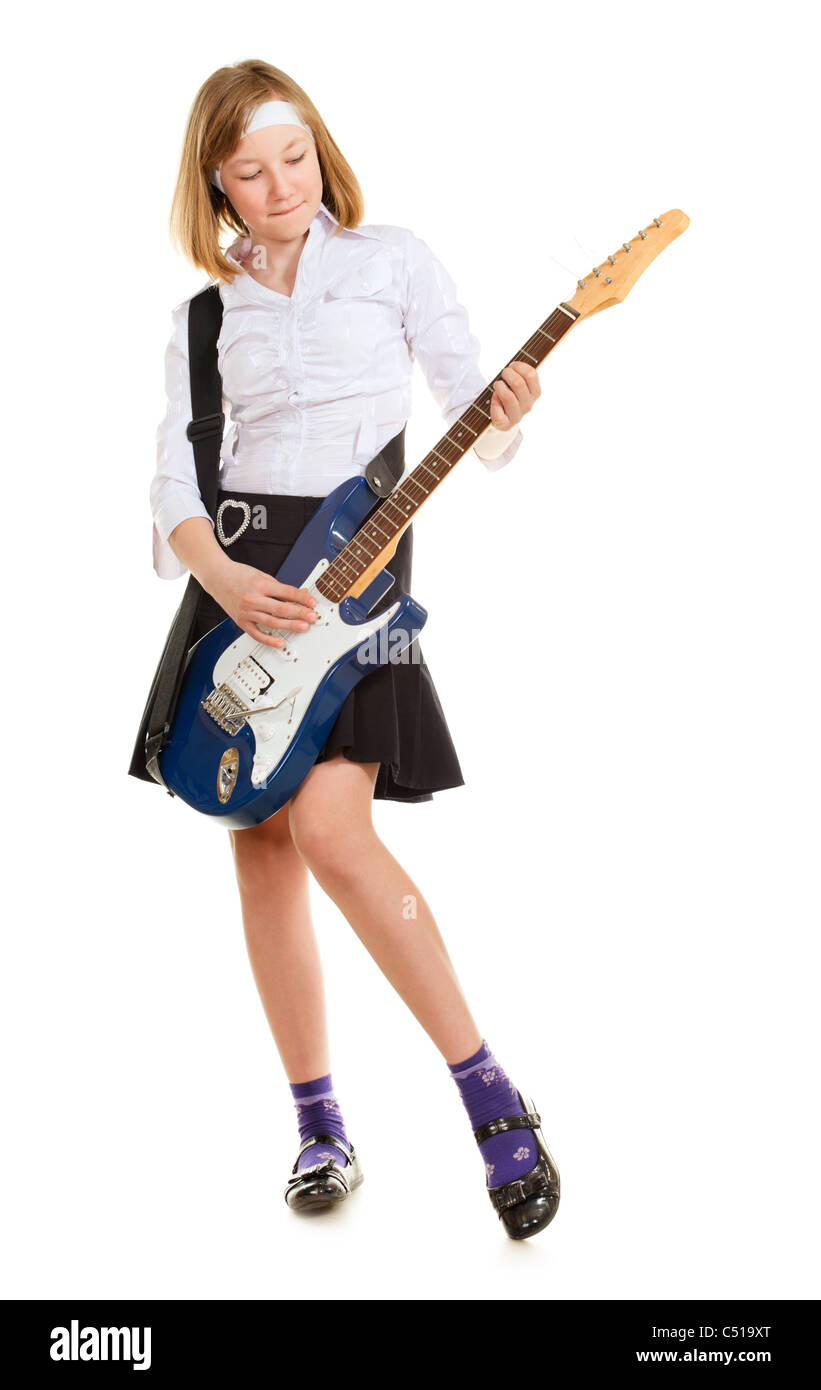 teen girl playing on a guitar, isolated on white Stock Photo