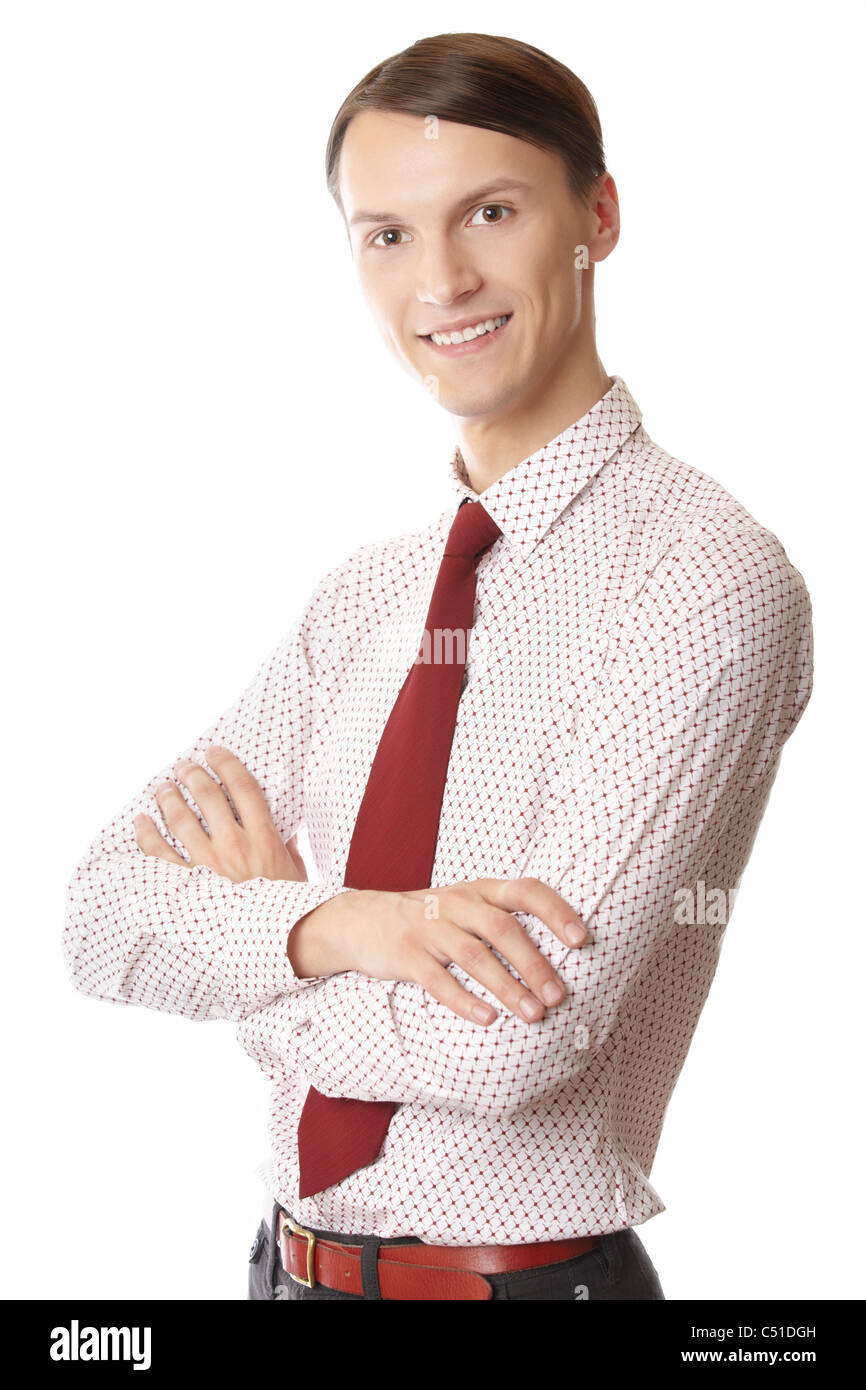 Young smiling businessman with arms crossed on a white background Stock ...