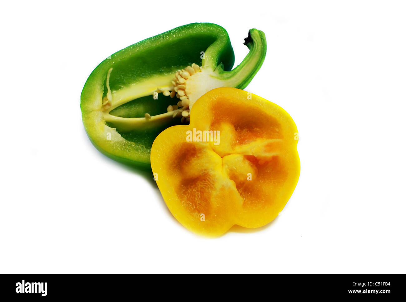 cut green and yellow sweet peppers isolated Stock Photo Alamy