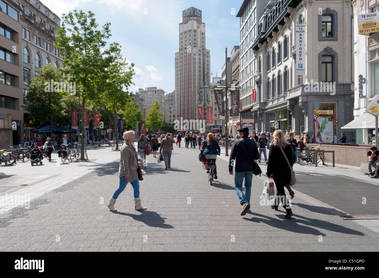 A sunlit busy street scene in Antwerp, Belgium. Stock Photo