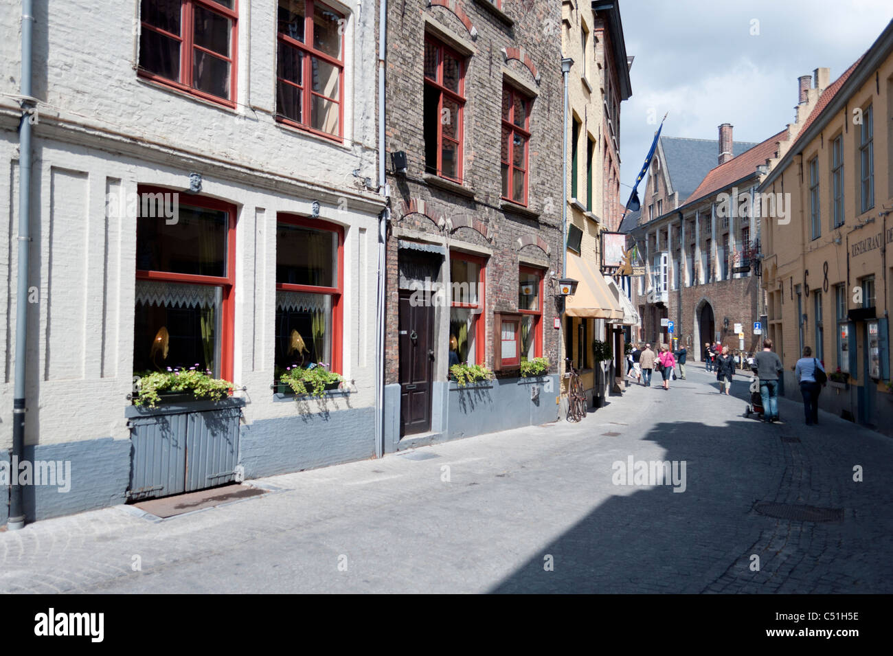 A sunlit quiet street scene in Antwerp, Belgium. Stock Photo
