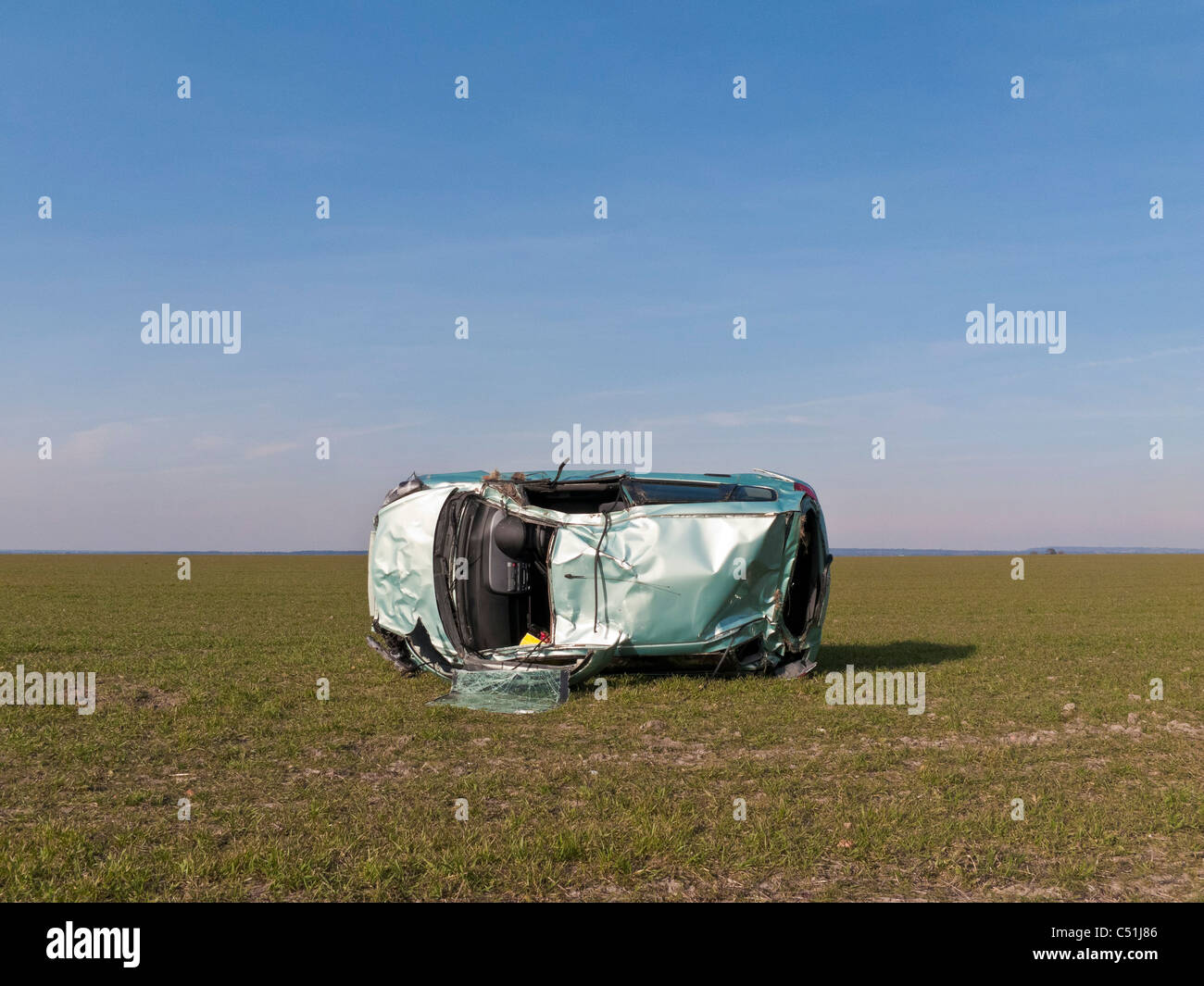 Honda Jazz car accident wrecked rolled in field. JMH5081 Stock Photo