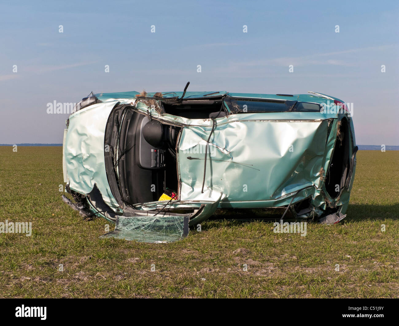 Honda Jazz car accident wrecked rolled in field. JMH5083 Stock Photo