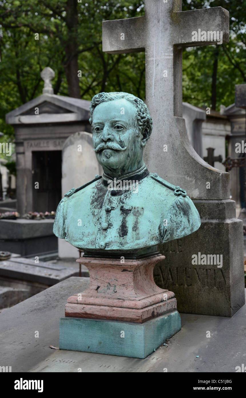 Bust on a grave in Montmartre Cemetery, Paris, France. Stock Photo