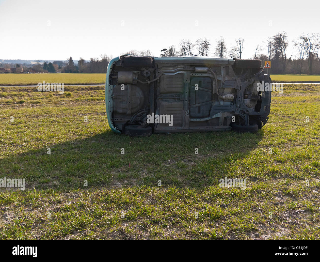 Honda Jazz car accident wrecked rolled in field. JMH5090 Stock Photo