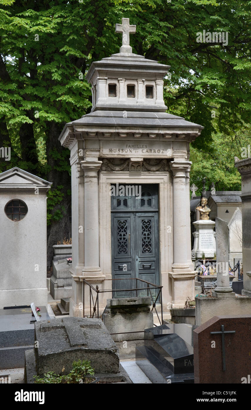 A fairly typical tomb as seen in many French graveyards, this one is in Montmartre Cemetery, Paris, France. Stock Photo