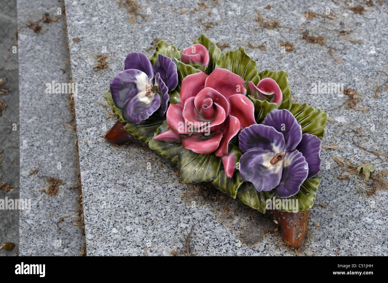 Ceramic flowers on a grave in Montmartre Cemetery, Paris, France Stock Photo Alamy