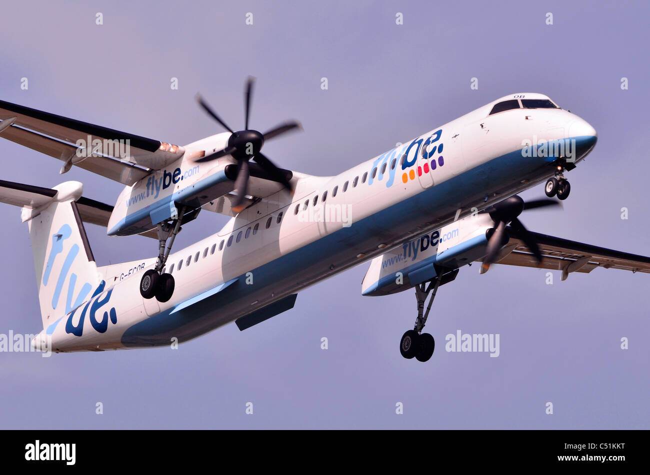De Havilland Canada DHC-8 Dash 8 operated by Flybe on final approach for landing at Birmingham Airport, UK Stock Photo