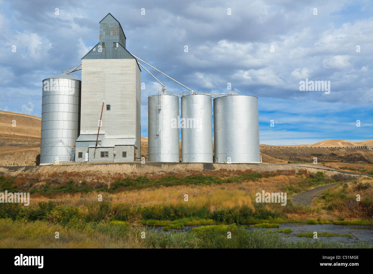 Grain Silos, Creek, Palouse, Eastern Washington Stock Photo
