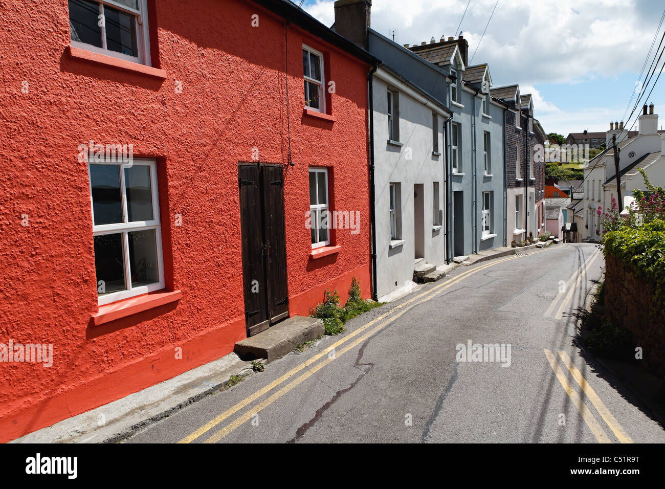 Colorful Row Houses Along Haven Hill Road, Kinsale Harbor; County Cork, Ireland Stock Photo