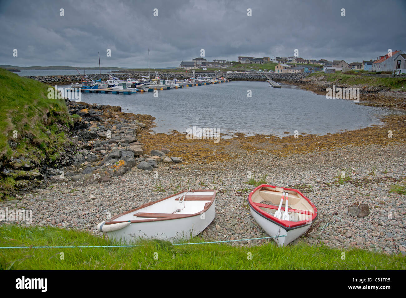 Small rowing boats hauled ashore at Hamnavoe, Shetland Isles. SCO 7431 Stock Photo Alamy