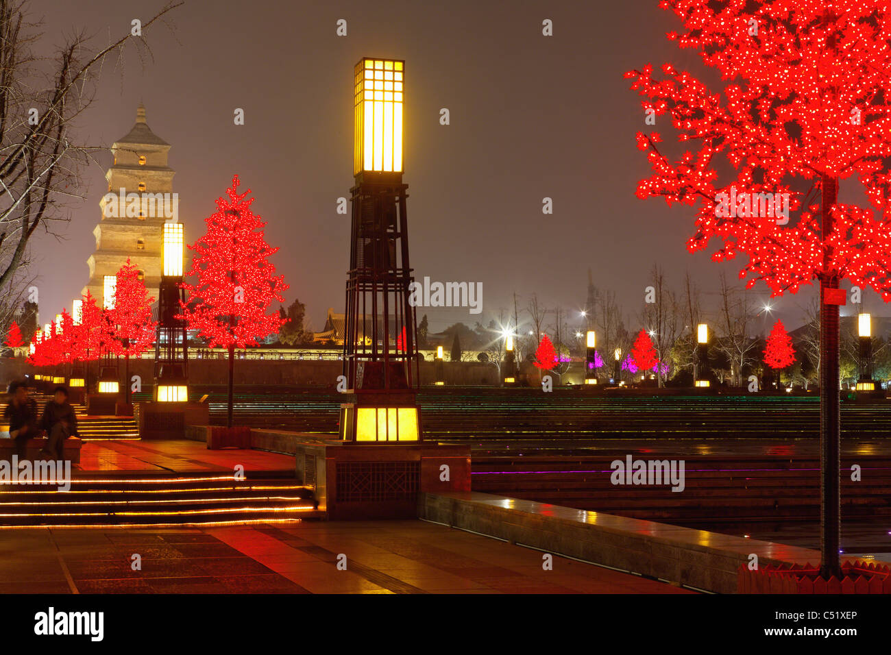 North Square of Big Wild Goose Pagoda with Illuminated Trees Stock Photo