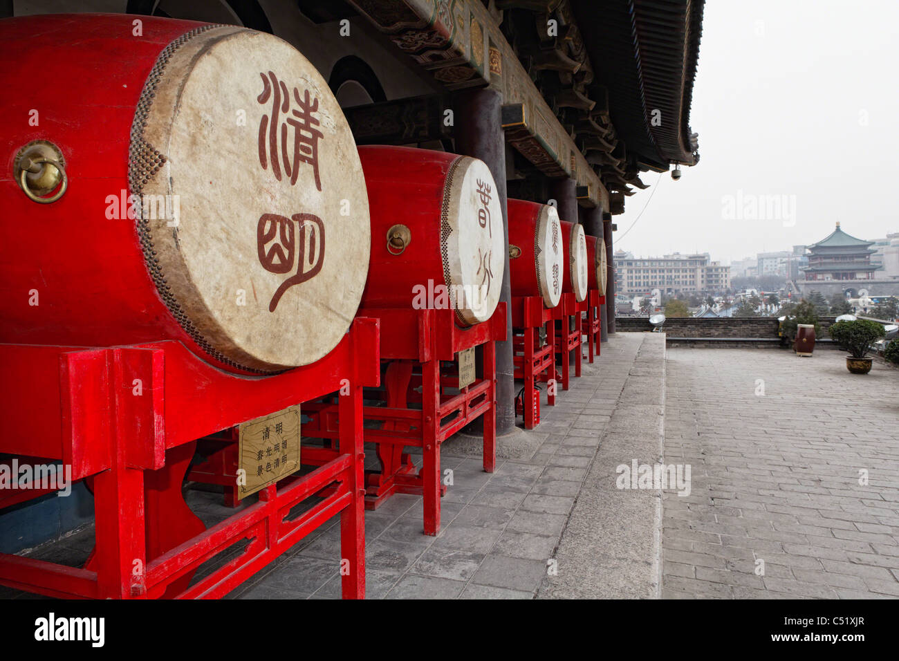 Drums on Display at the Exterior of the Xian City Drum Tower, Shaanxi, China Stock Photo